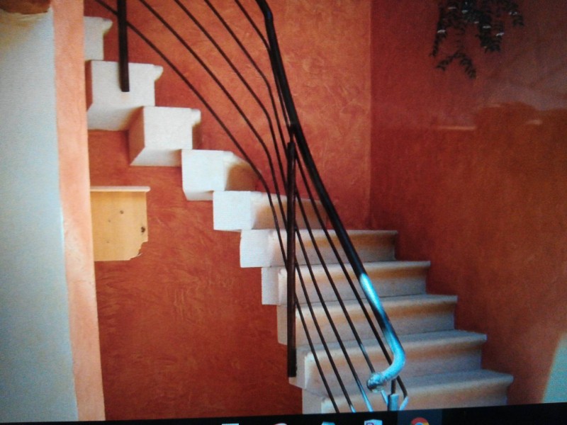 rampe en fer forgé pour escalier béton sur Nïmes dans le Gard