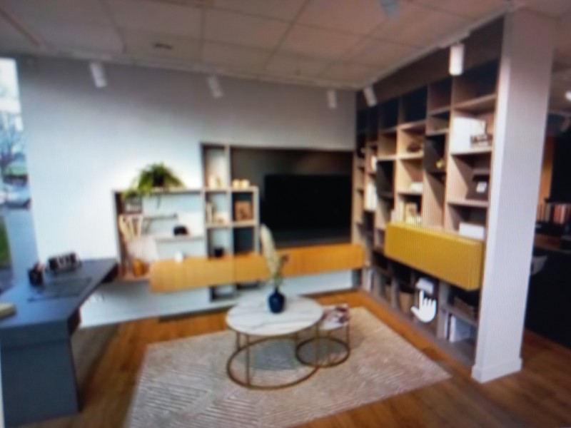 pose installation d'une bibliothèque murale avec télévision intégrée à Chambéry proche d'Aix-les-Bains