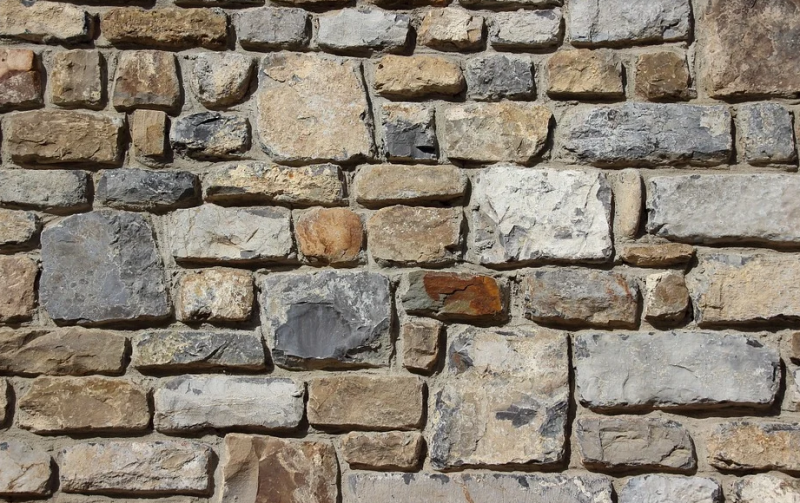 Pose d'un enduit de mure de clôture à Orange dans le Vaucluse ?