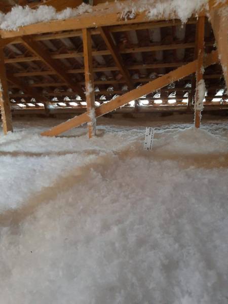 Isolation thermique de toiture réalisée par Conseil Energie Habitat