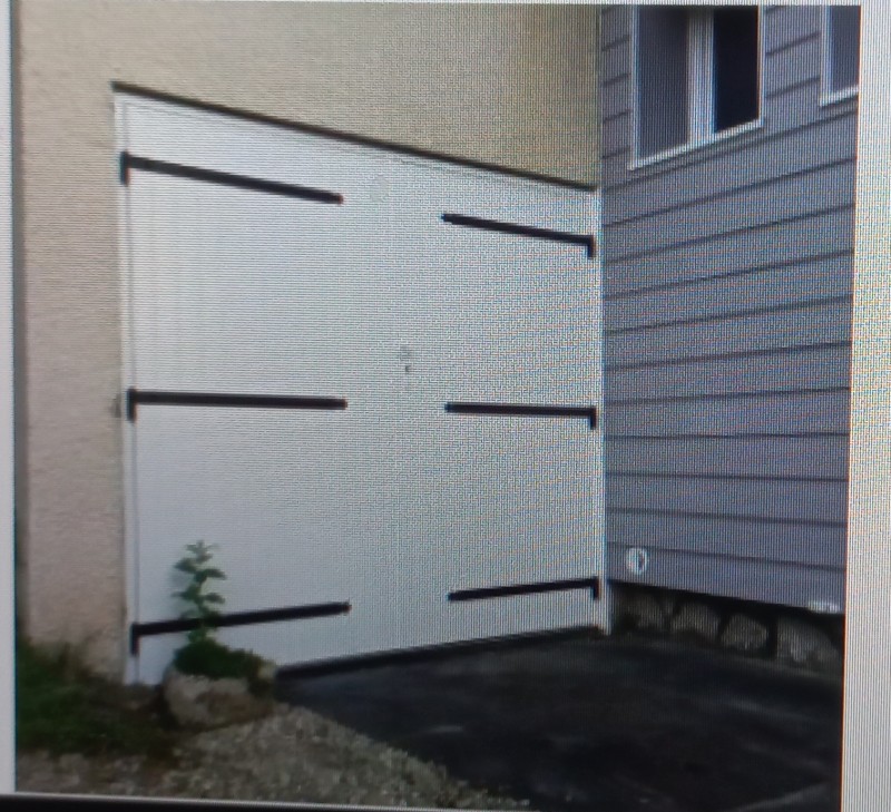 pose installation d'une porte de garage basculante électrique à Vauvert proche de Caissargues