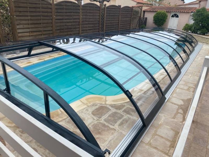 installation et pose d'un abri piscine extra plat telescopique motorisé sur Nîmes dans le Gard